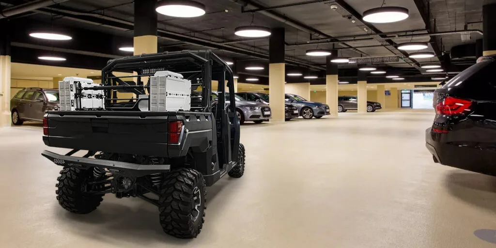 FlexSpec Mobile on a side-by-side vehicle inside a parking garage